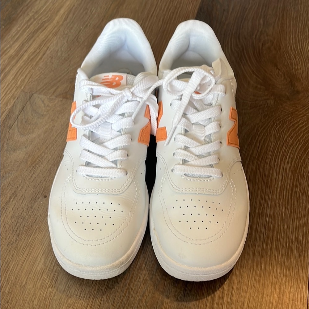 New Balance White and Orange Sneakers Womens SZ 8. Excellent condition.